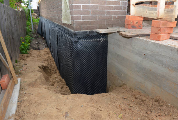 Happy homeowners after waterproofing job in North Prairie